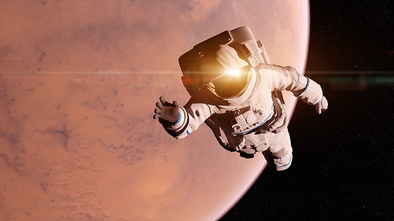 一个宇航员在火星前面的插图图片下载
