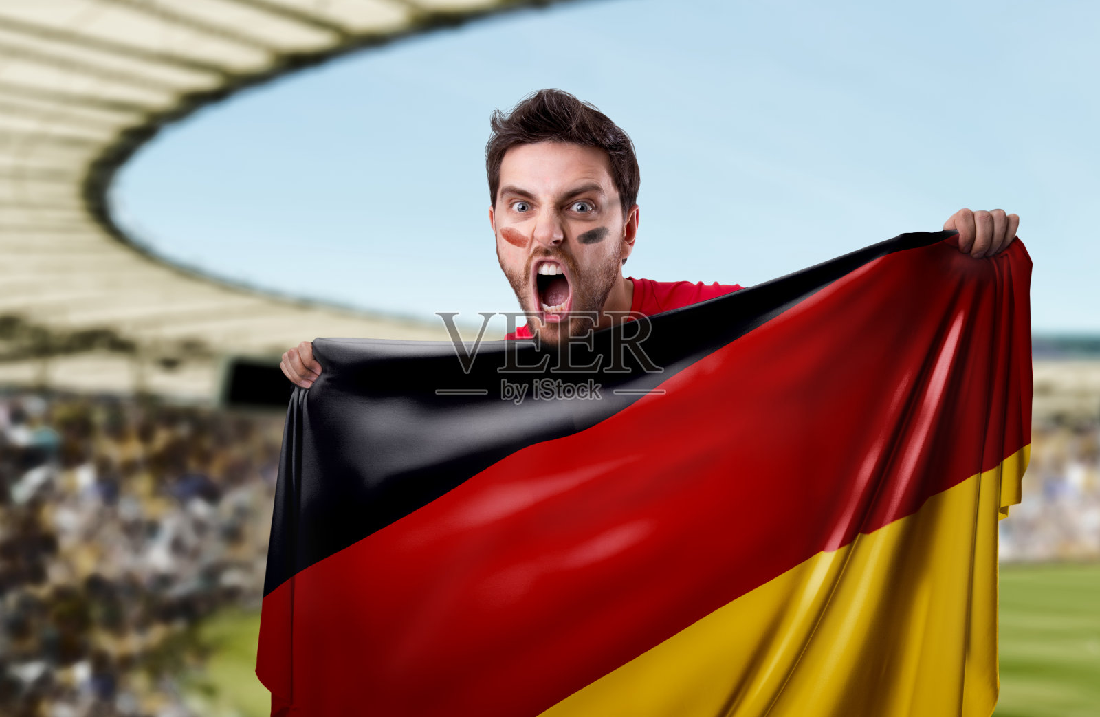 球迷举着德国国旗照片摄影图片