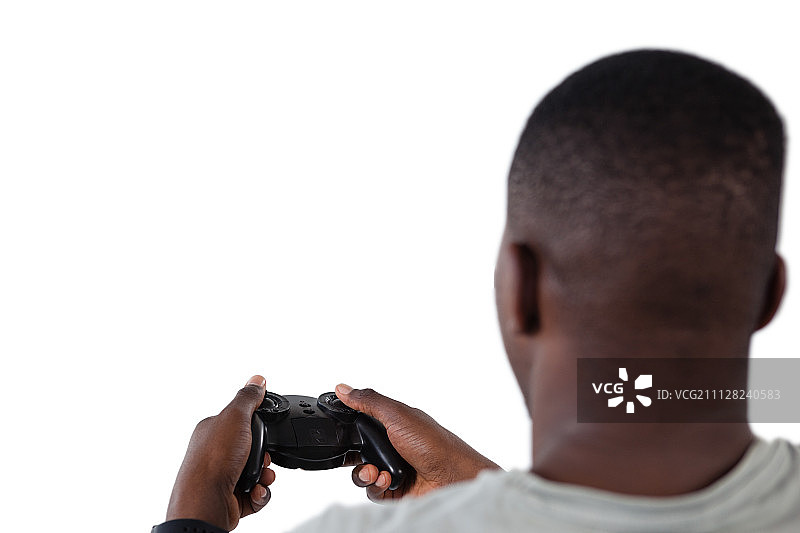 特写男子玩电子游戏的白色背景图片素材