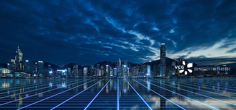 香港海岸线摩天大楼繁华夜景和科技感地面图片素材