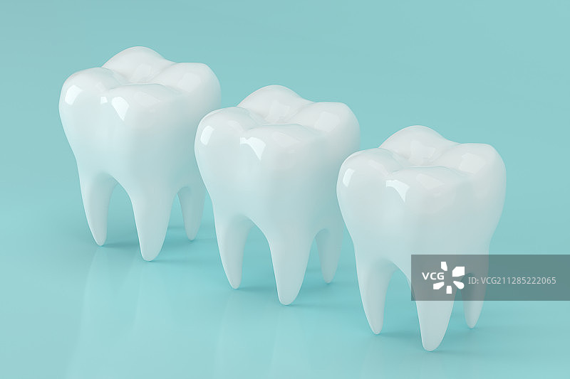 蓝色背景下三个牙齿模型 3D渲染图片素材