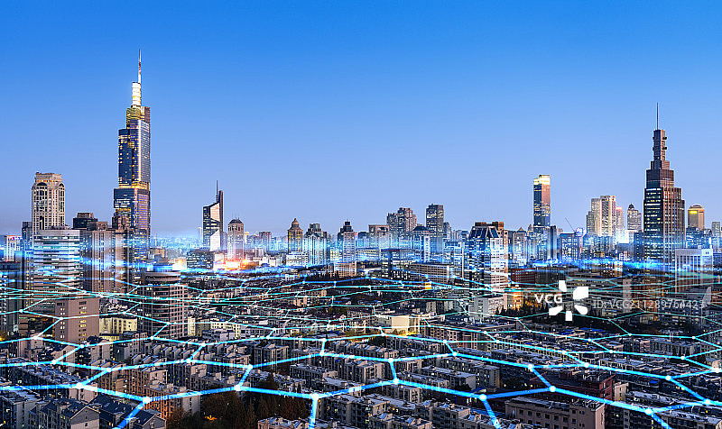 科技线条粒子合成的蓝调城市天际线图片素材