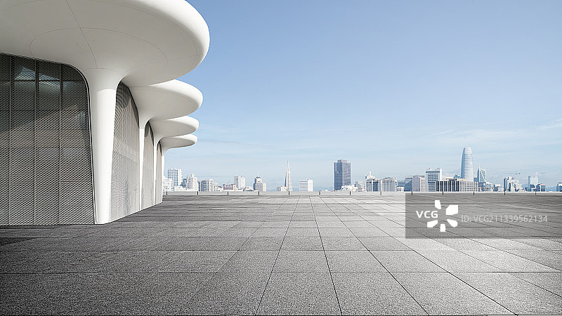 白色抽象造型现代建筑和空旷地面图片素材