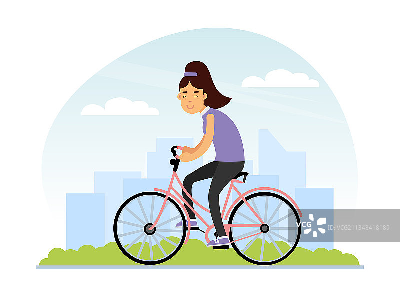 年轻女子性格骑自行车旋转图片素材