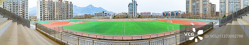 中国足球场和看台标志性建筑拍摄主题，绿色的体育场全景图，户外无人图像摄影图片素材