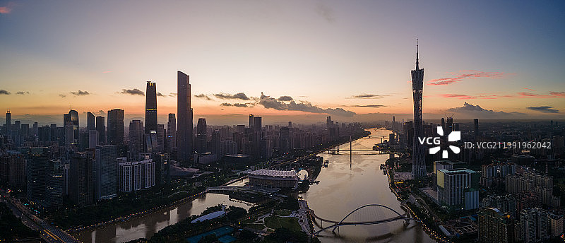 广州塔和海心桥珠江新城城市天际线日出风光航拍图片素材