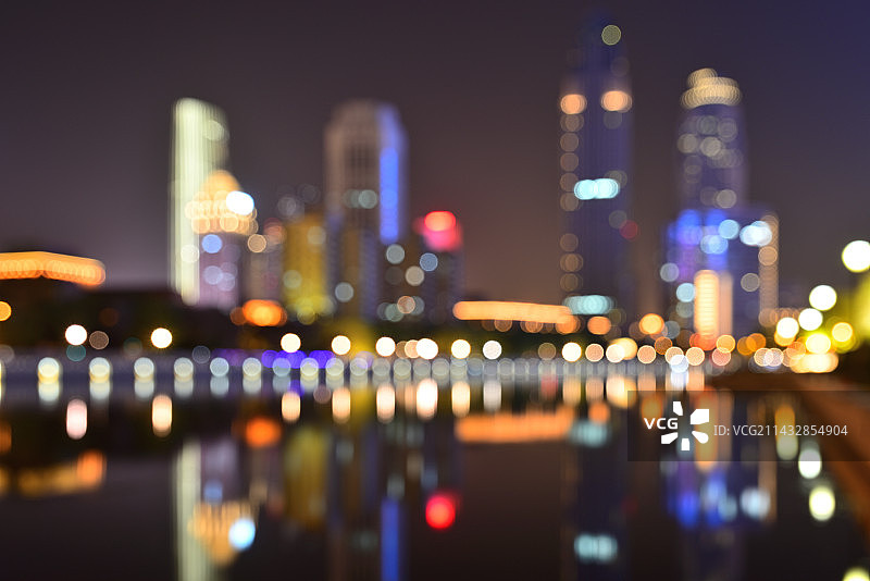 天津海河五彩斑斓的模糊夜景城市风光图片素材