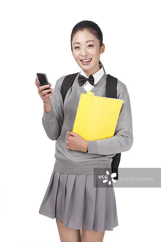 一个身穿校服背着包女学生图片素材
