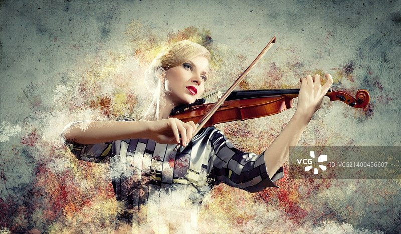美丽的女小提琴手的形象与丰富多彩的背景演奏图片素材