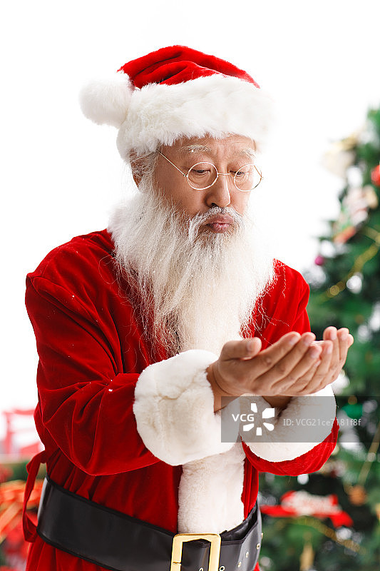 一个圣诞老人变魔法图片素材