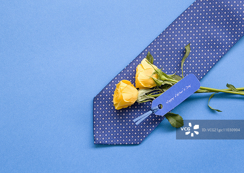 领带和黄玫瑰图片素材