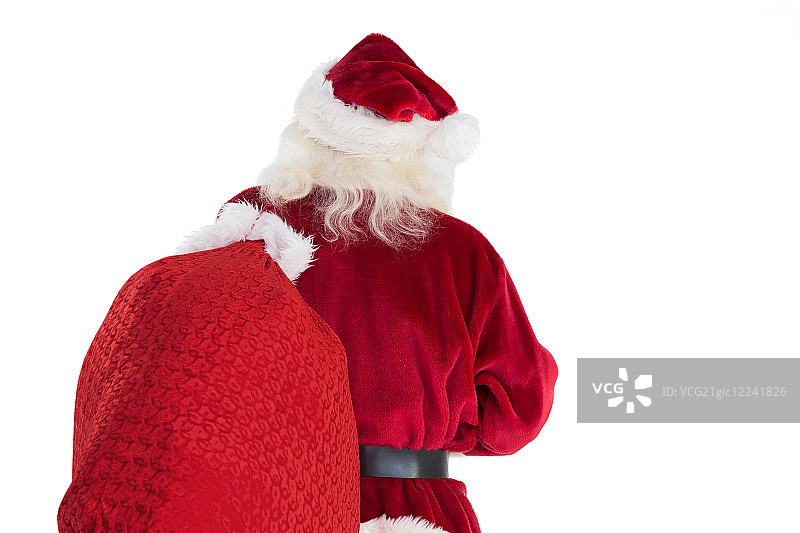 圣诞老人把他的包放在白色的背景上带走了图片素材