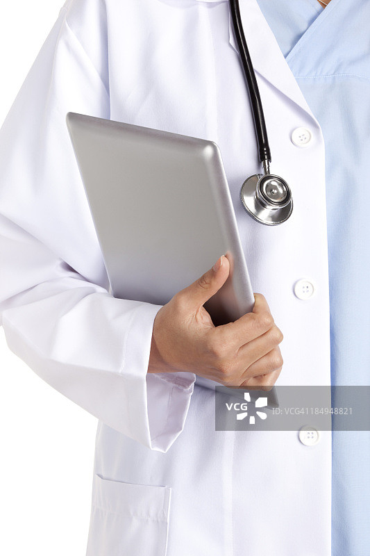 一个穿着白大褂拿着听诊器拿着药片的医生图片素材
