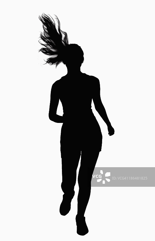 女人跑步的剪影。图片素材