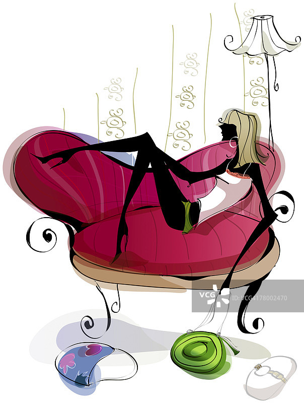 一个女人斜靠在沙发上的侧影图片素材