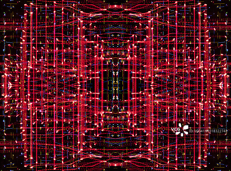 近景抽象图案交织的彩色光束红色在黑色的背景。图片素材