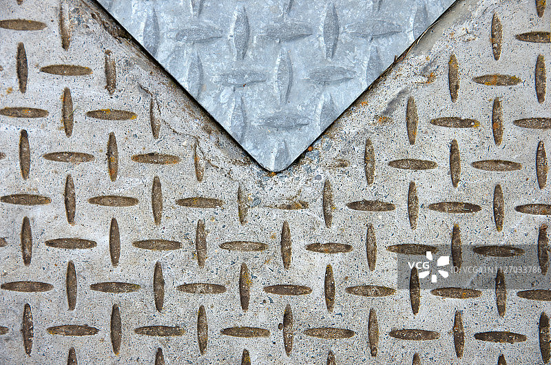 钢板与混凝土具有交叉开口的防滑纹理图案图片素材