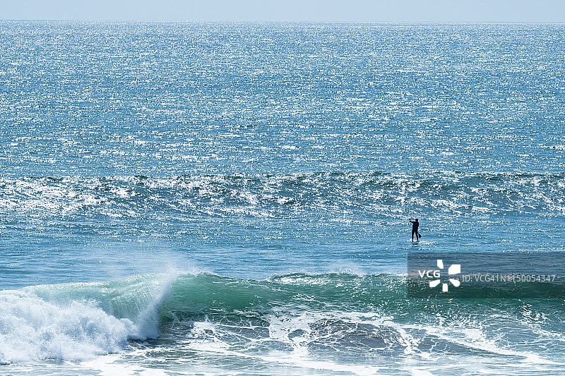 加州海滩上的划水者图片素材