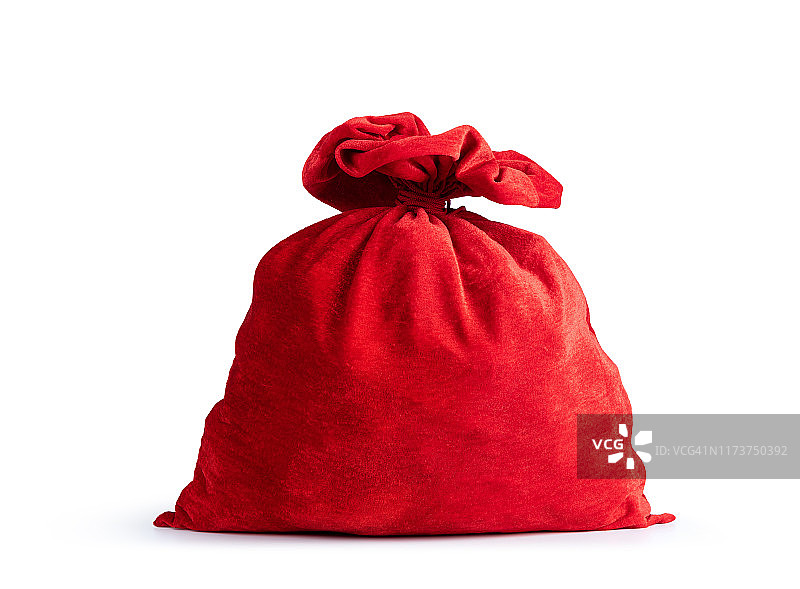 圣诞老人的红袋子里装满礼物，孤立在白色的背景上。文件包含到隔离的路径。图片素材