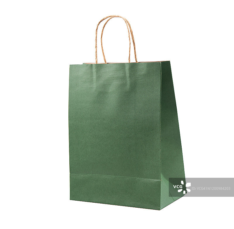 绿色纸袋孤立在白色背景。模型设计图片素材