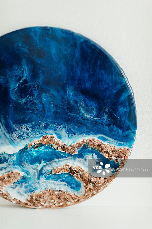 手工海洋环氧树脂装饰。液态大理石纹理-液态艺术装饰。现代潮流的艺术作品。图片素材