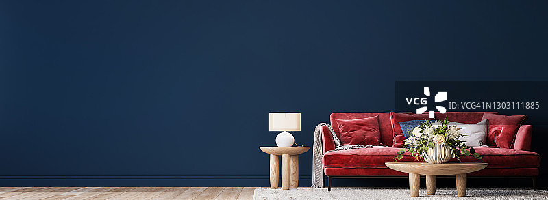 客厅内部模拟红色沙发，木桌和藤条家装在深蓝色的背景，全景图片素材