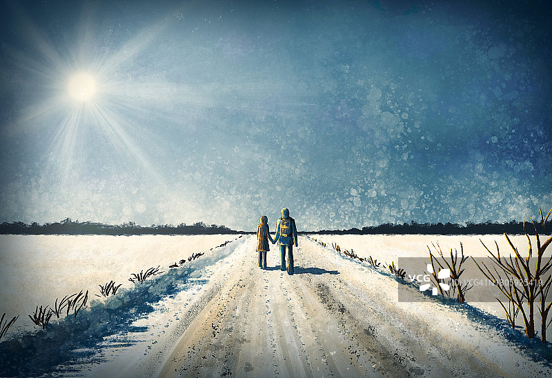 一对夫妇在冬天的白雪中散步。图片素材