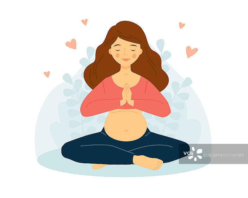 孕妇练习瑜伽。这个女孩正在冥想。合十礼。图片素材