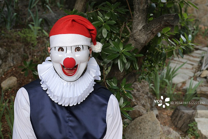 圣诞节期间可怕的小丑图片素材