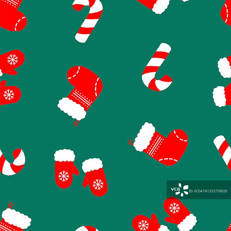 圣诞节无缝图案的拐杖糖、手套和圣诞袜。图片素材
