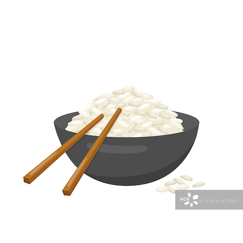 用筷子夹米饭。图片素材