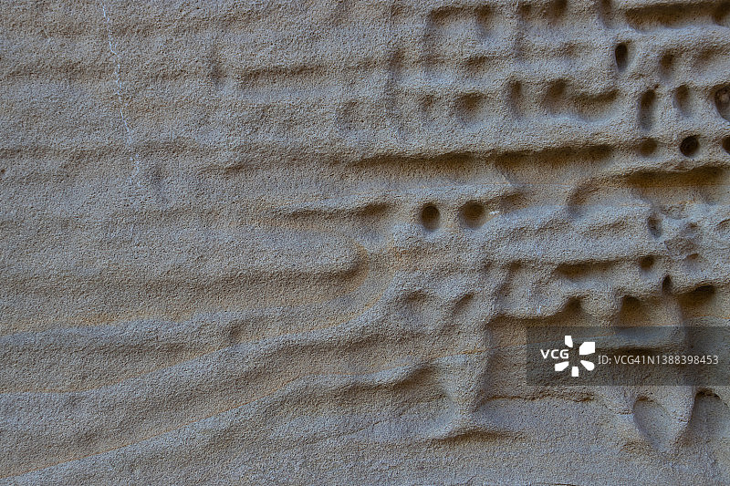 水洗出的自然棕色砂岩纹理的细节，完整的背景框架图片素材