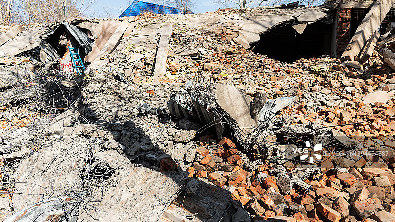 建筑残骸,废墟。垃圾成堆的背景。污染、地震、自然灾害的概念。图片素材