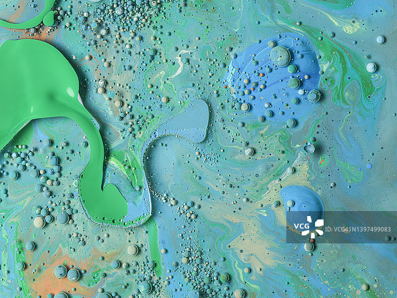 旋涡，泡泡蓝和绿色油漆图片素材