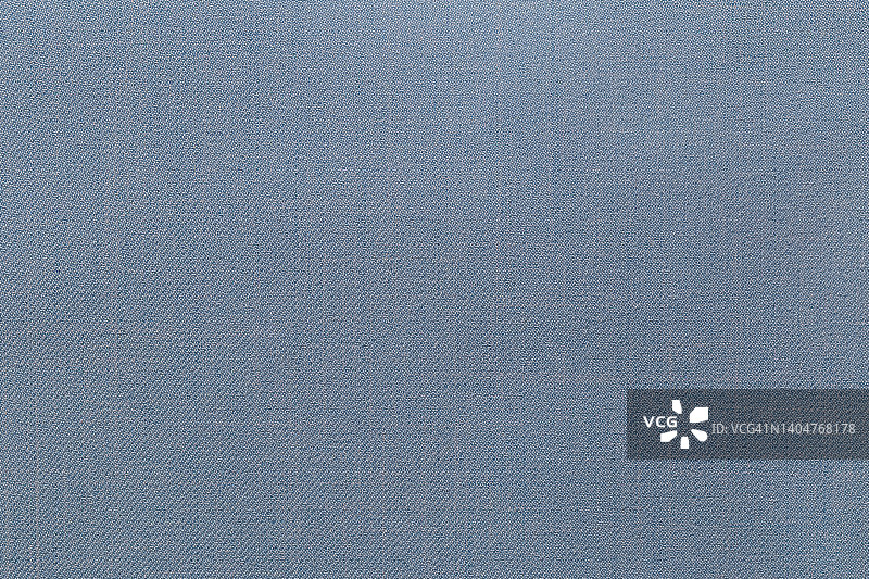 蓝色布布涤纶纹理和纺织背景。图片素材
