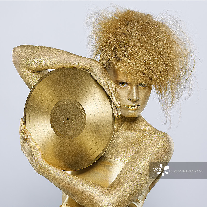 黑胶唱片的黄金女郎图片素材