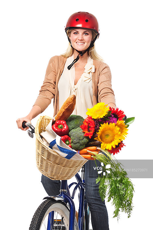 健康的生活方式在白色背景下骑自行车去杂货店购物图片素材