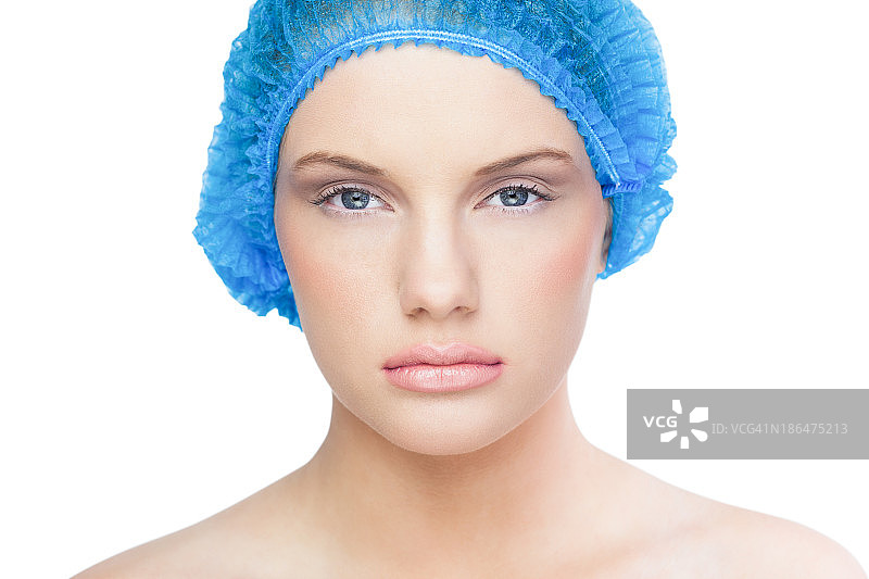 戴着蓝色手术帽的漂亮模特图片素材