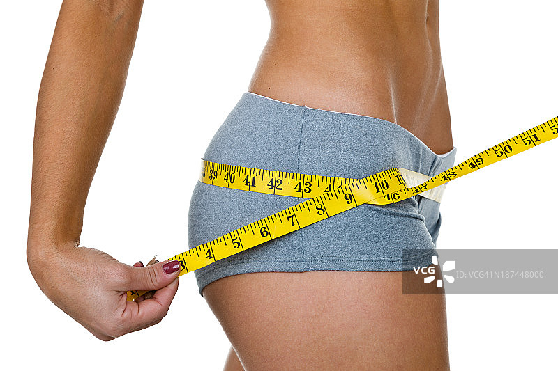 测量臀部的女人图片素材