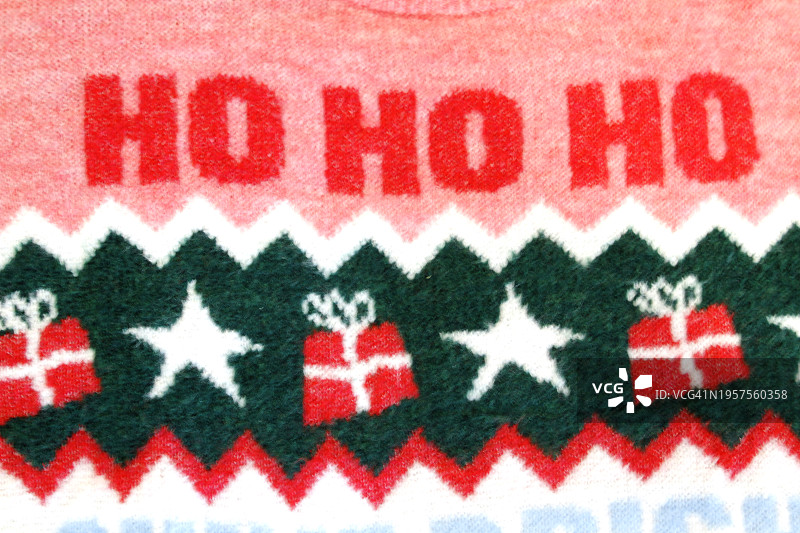 圣诞红绿针织毛衣特写。背景图片素材