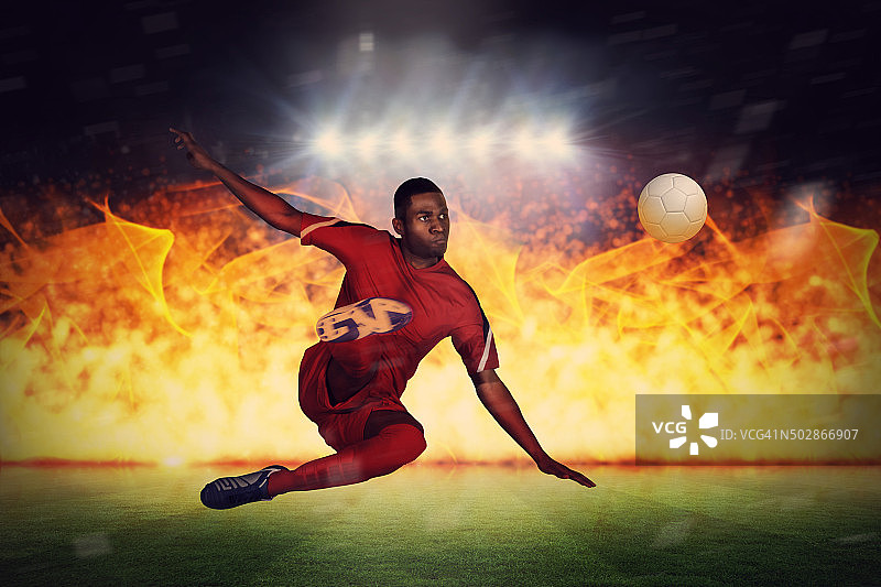 合成图像的足球运动员在红色踢图片素材