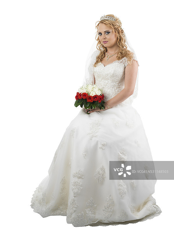 新娘穿着婚纱，孤立在白色上图片素材