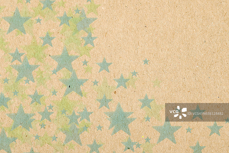 老式的星星在纸盒的背景图片素材