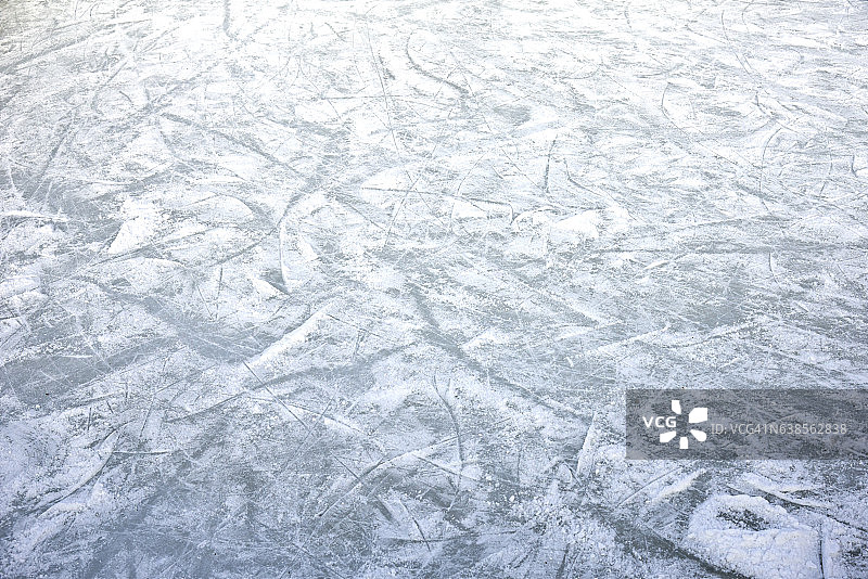 冰的背景有溜冰和曲棍球的痕迹图片素材