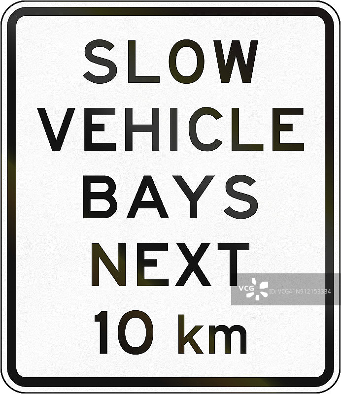 新西兰道路标志-在接下来的10公里缓慢的车辆港湾图片素材