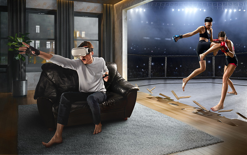 戴着VR眼镜的男人。虚拟现实与女性综合武术图片下载