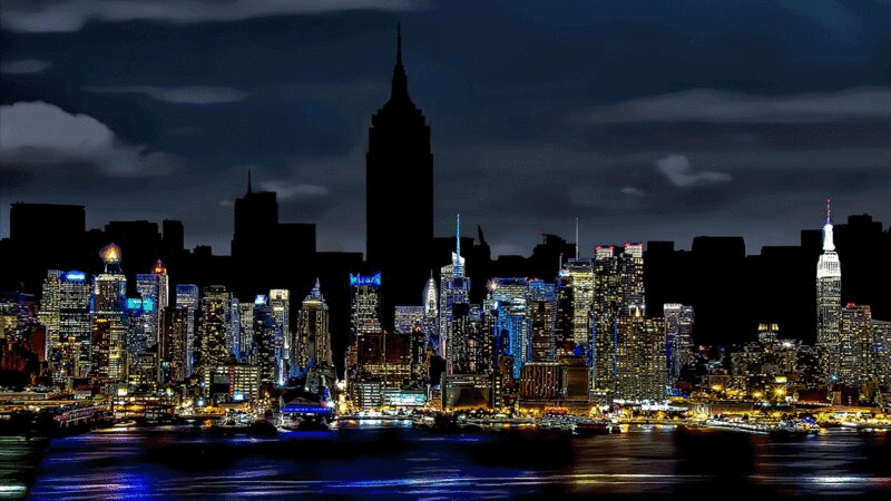 照亮天际线在晚上与轮廓的天际线在背景，与哈德逊河在前景，纽约市，纽约，美国图片下载