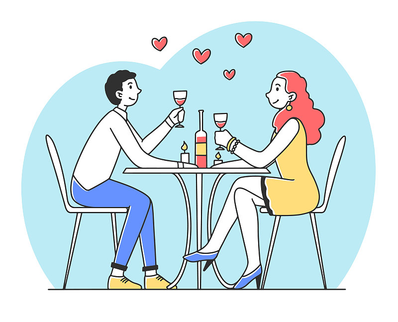 年轻夫妇坐在餐厅里吃浪漫晚餐图片下载