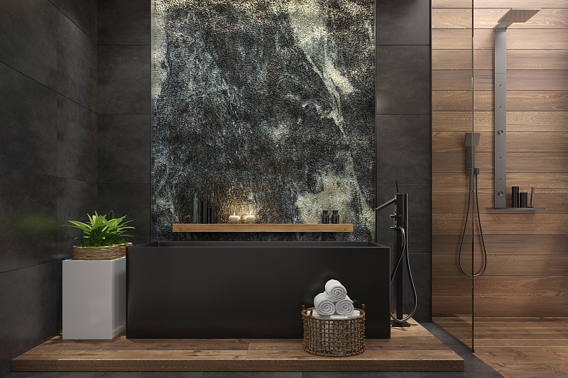 水疗浴室在豪华的现代别墅与巨大的天然岩壁图片素材