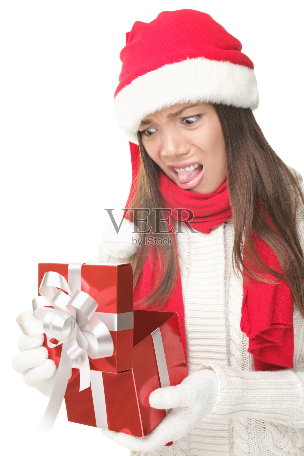 圣诞节送礼物的女人不高兴拆开礼物照片摄影图片